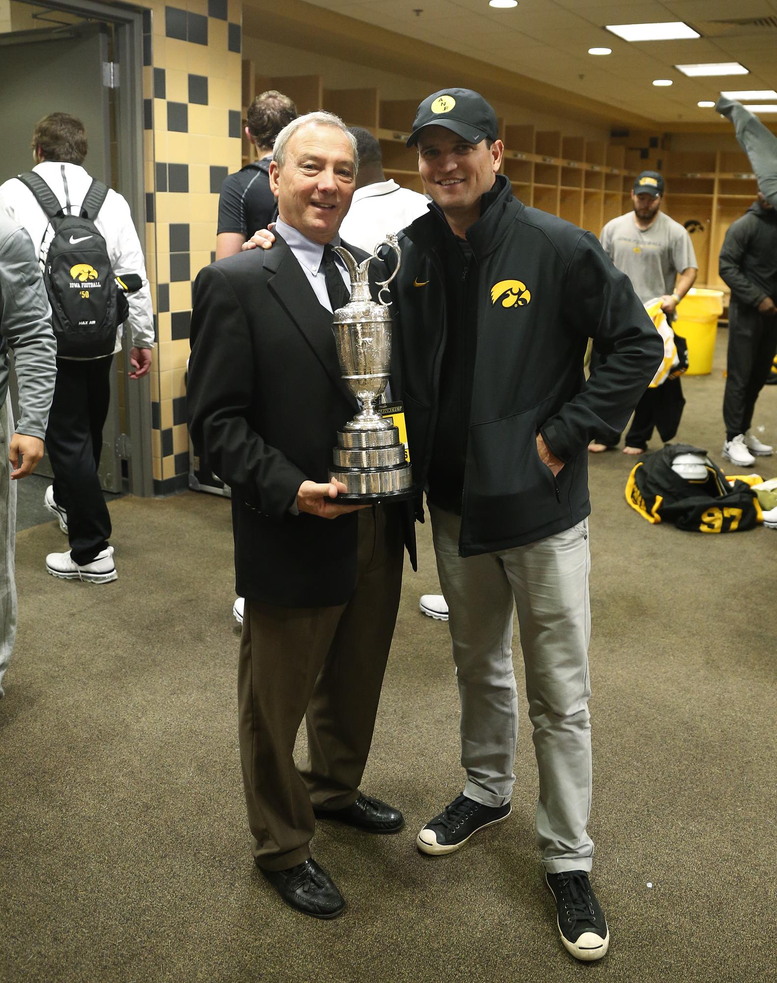 Steve Roe with the Claret Jug and Zach Johnson.